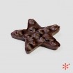 Estrella de chocolate negro y avellanas