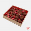 Caja de trufas de chocolate negro y mini corazones